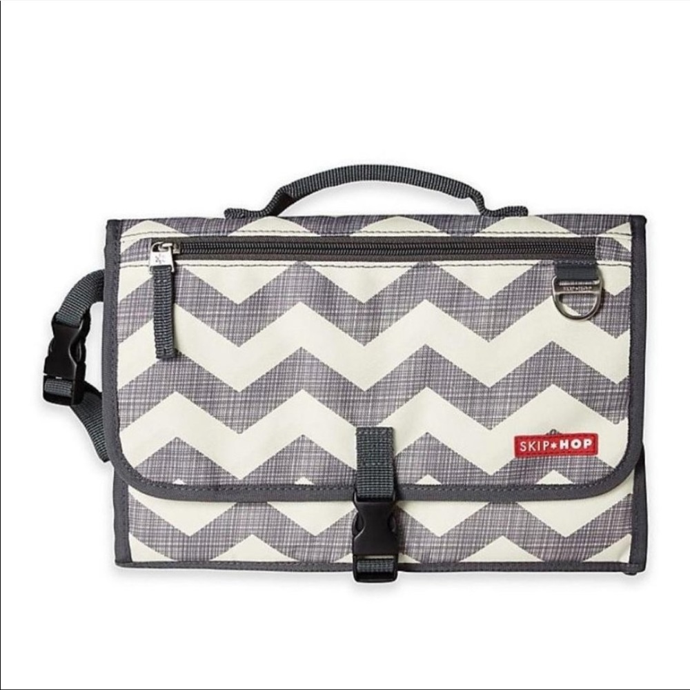 The Skip Hop Pronto Changing Station gray white diaper caddy portable